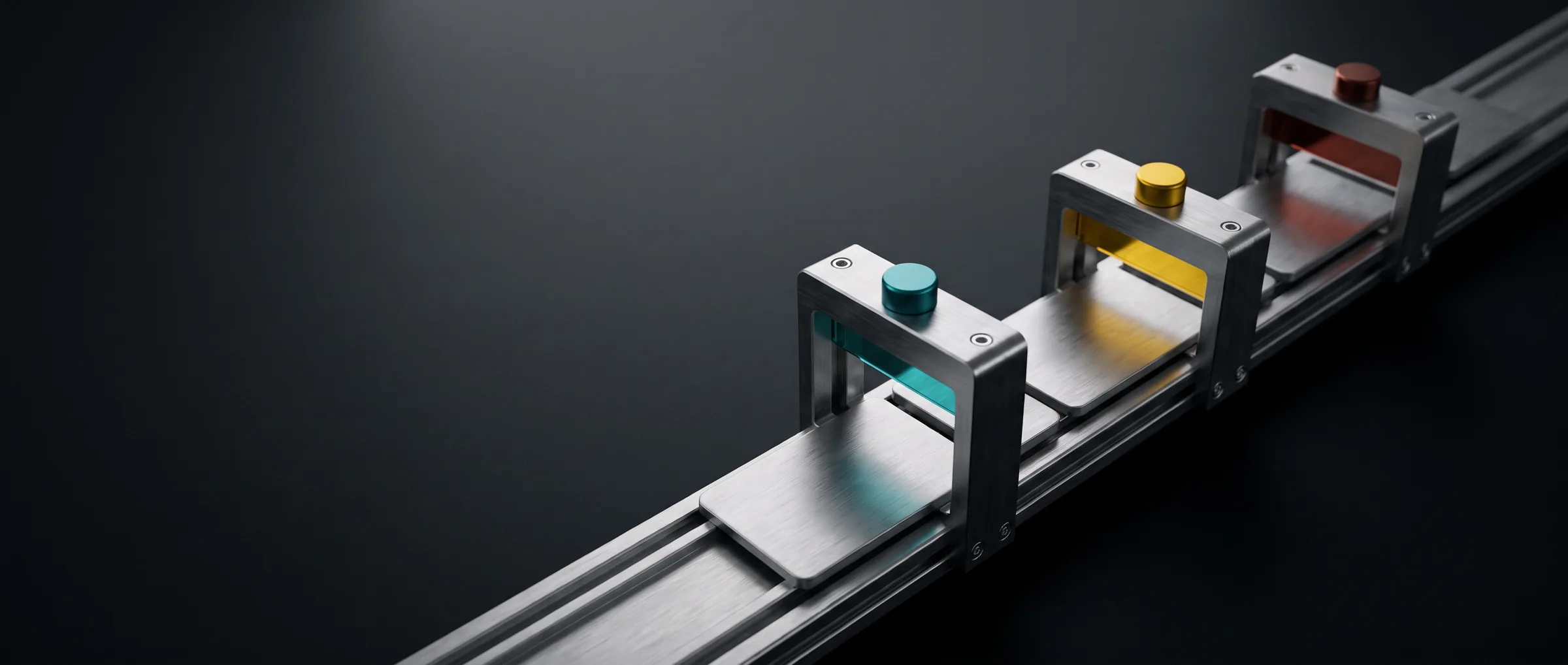 Steel plates moving along a rail through three gates marked teal, yellow and red.